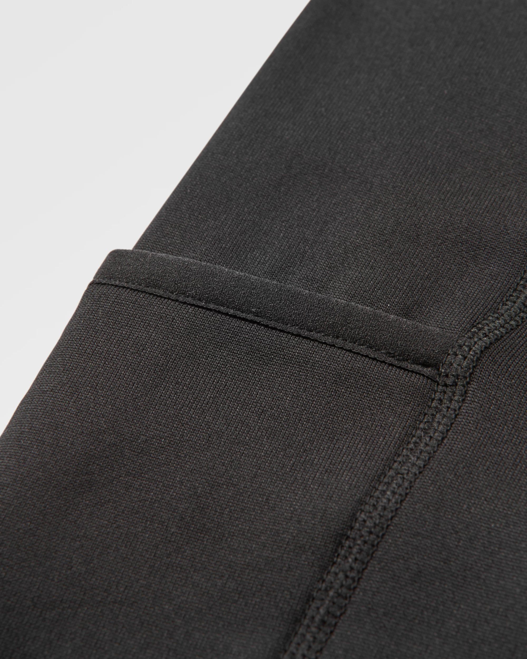 Solitude Recycled Polartec® Legging - Black - Flatlay