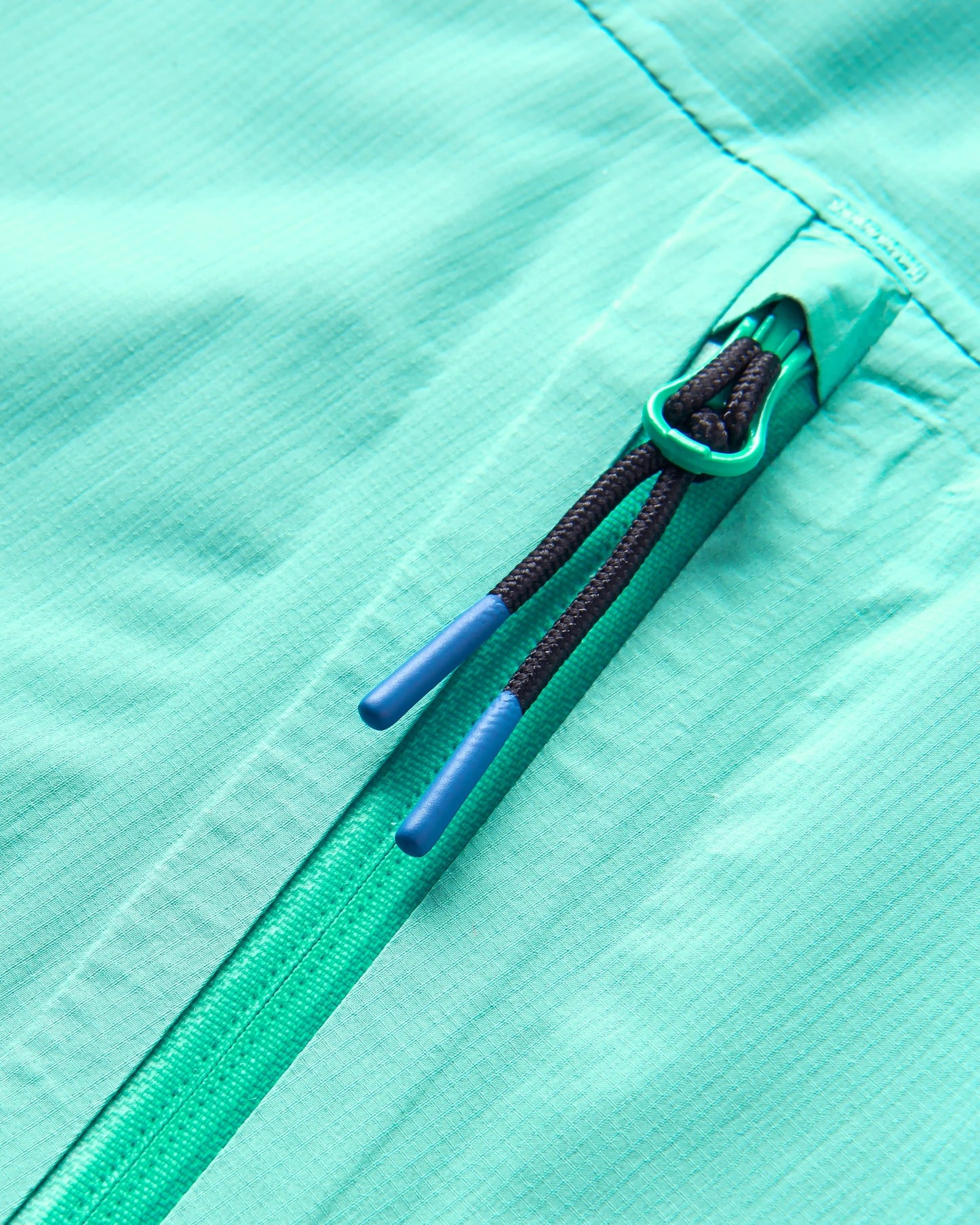 Trailscape Light Women's Recycled Waterproof Jacket - Aqua - Flatlay