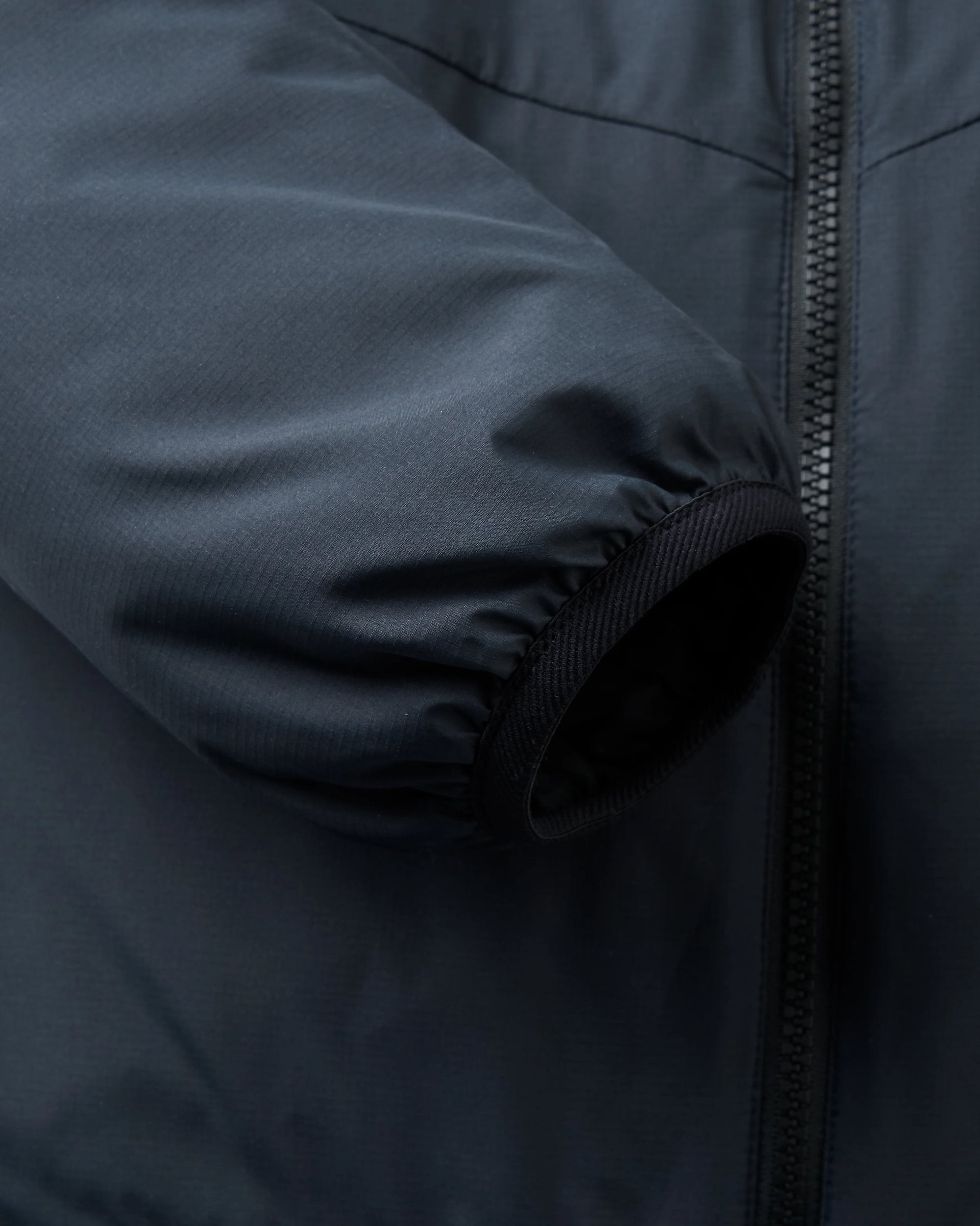 Daybreak Lightweight Recycled Thermore® Hoodless Jacket - Black - Flatlay