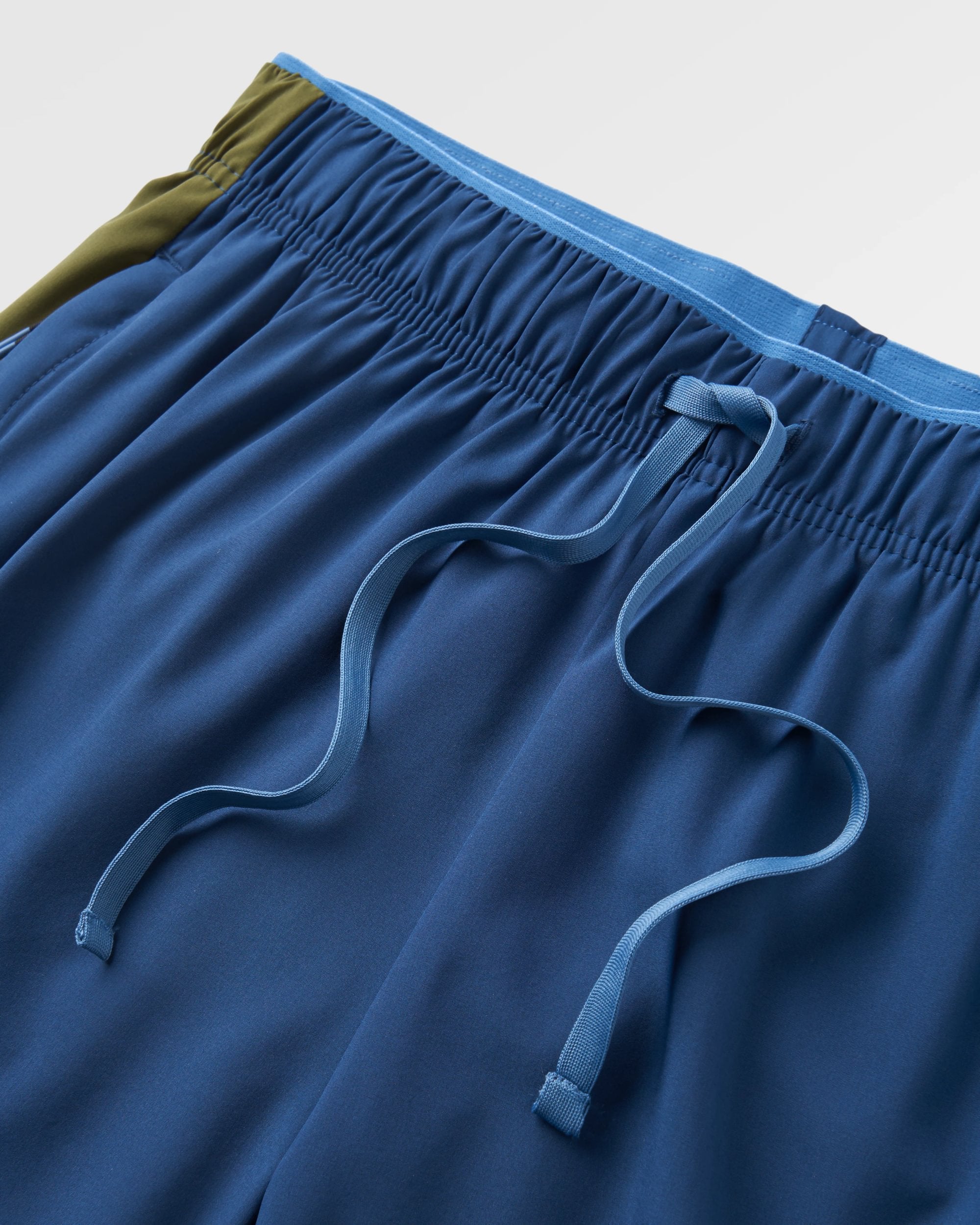 Swift Recycled Trail Short - Dark Denim - Flatlay